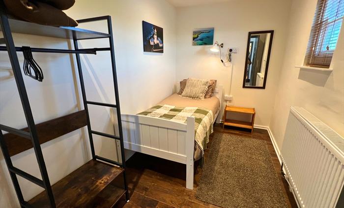 Bedroom 3 - single - courtyard view